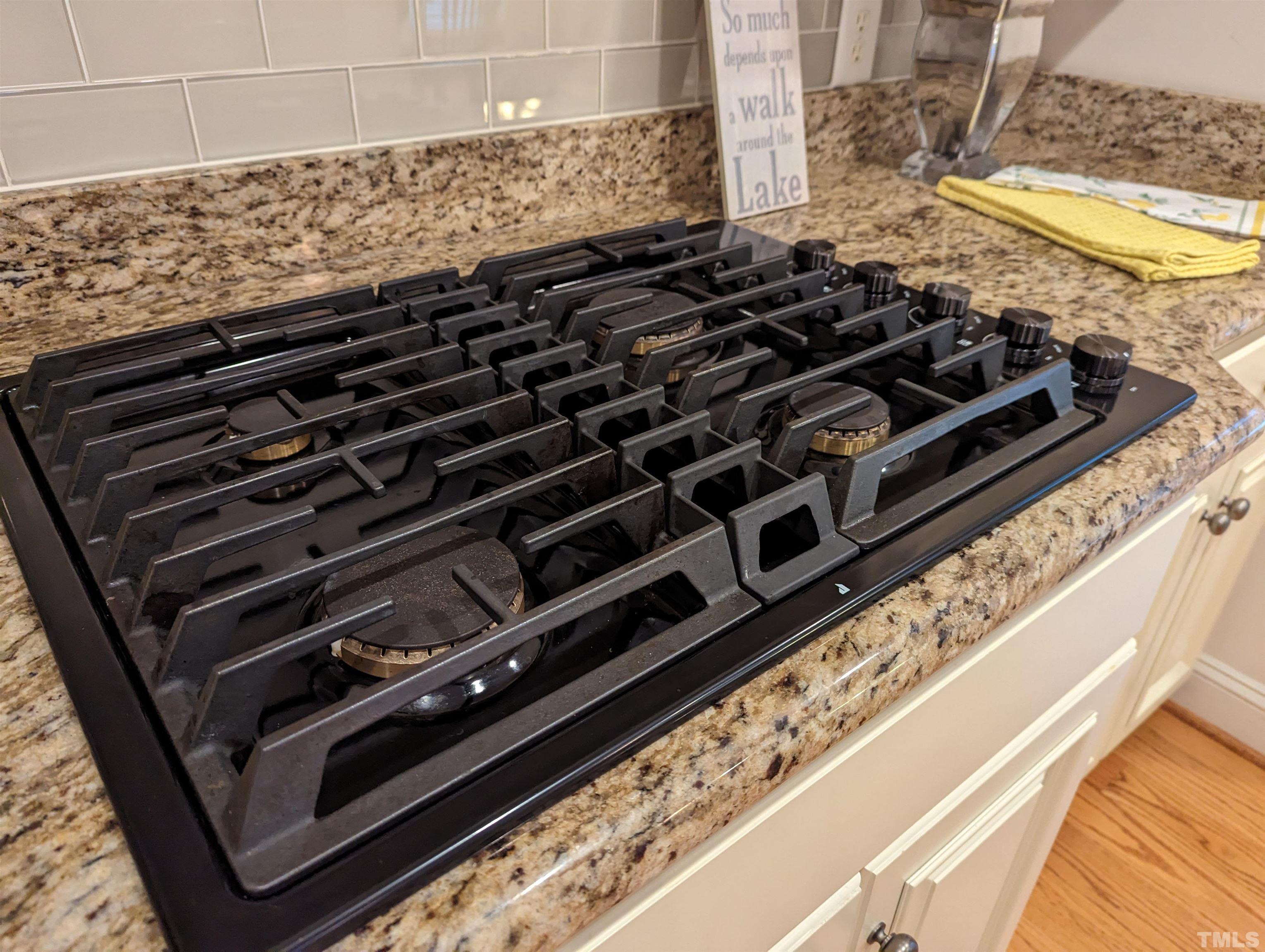 361 Sandy Point Drive Manson, NC 27553 - Photo 22 of 49 a close up of a stove top oven