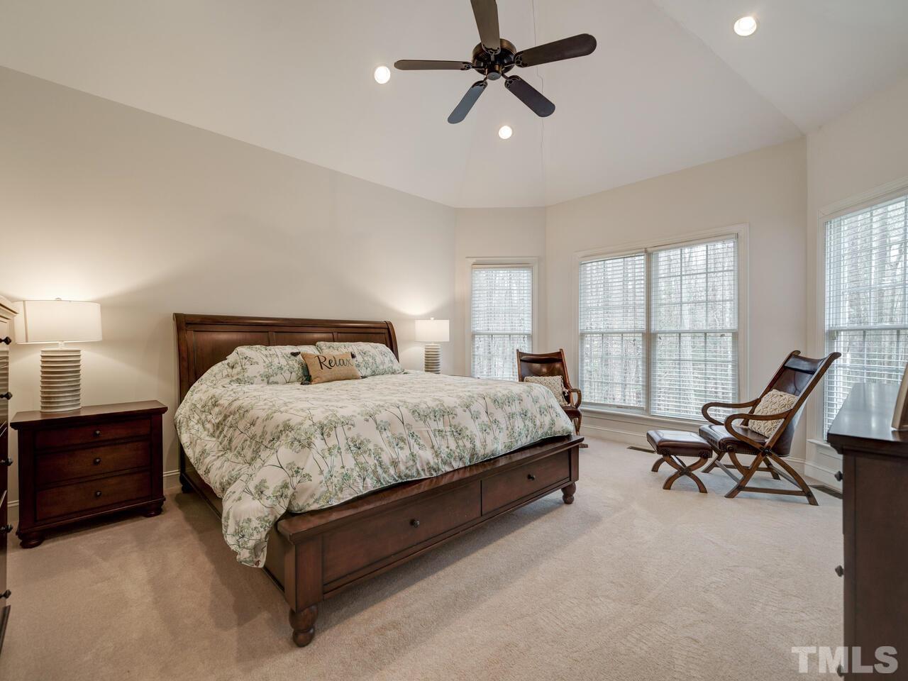 361 Sandy Point Drive Manson, NC 27553 - Photo 26 of 49 a bedroom with a bed chair and window