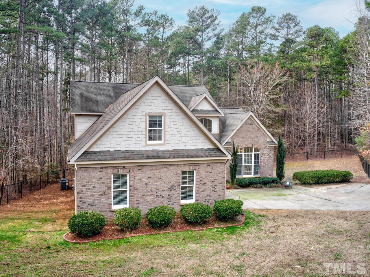 361 Sandy Point Drive Manson, NC 27553 - Photo 41 of 49 front view of a house with a yard