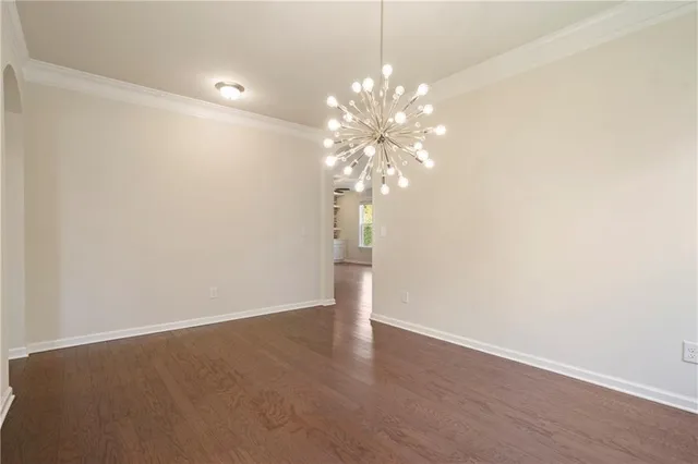 a view of a chandelier in big room