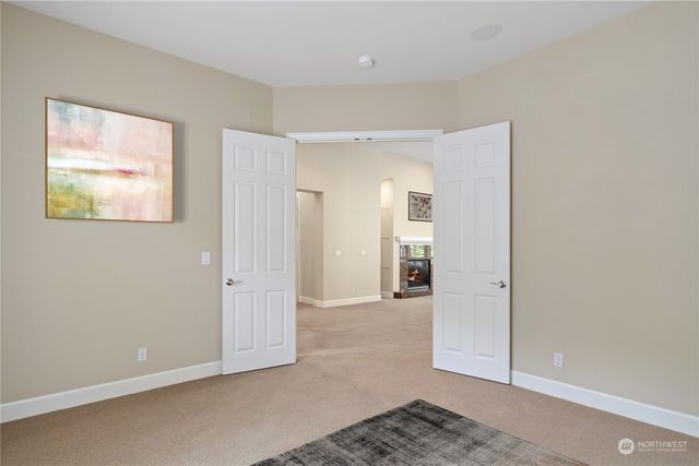 a view of livingroom with hardwood floor and hallway