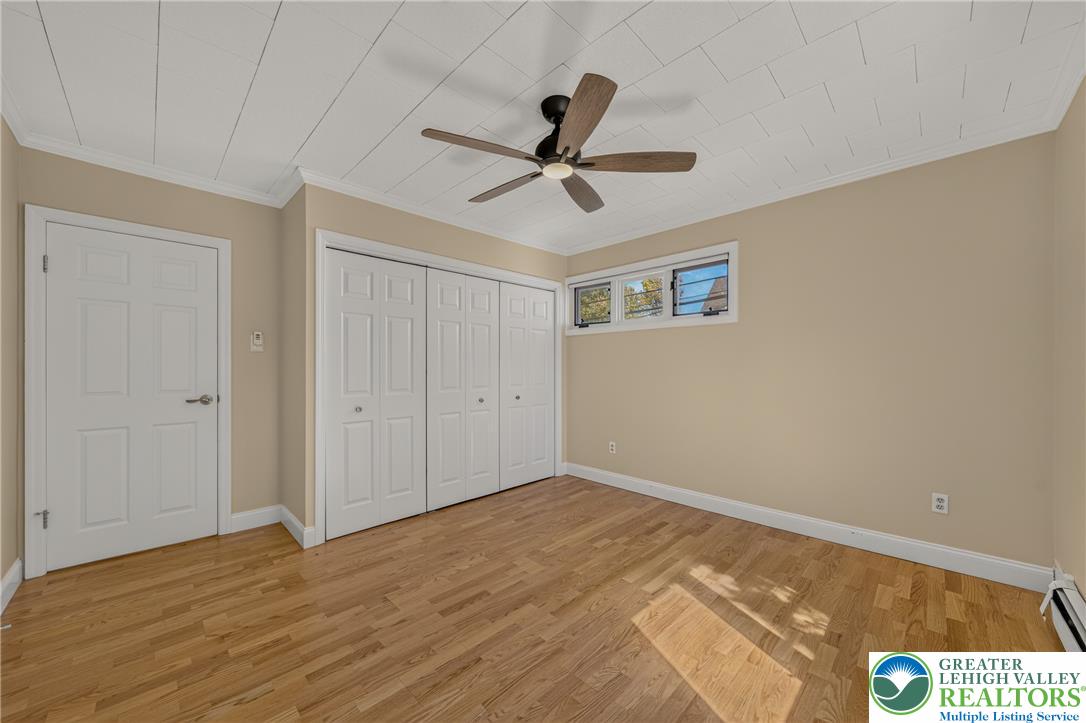 1814 Ruth Street Allentown, PA 18104 - Photo 26 of 54 Warm hardwood flooring complements the paneled ceiling in this comfortable bedroom space.