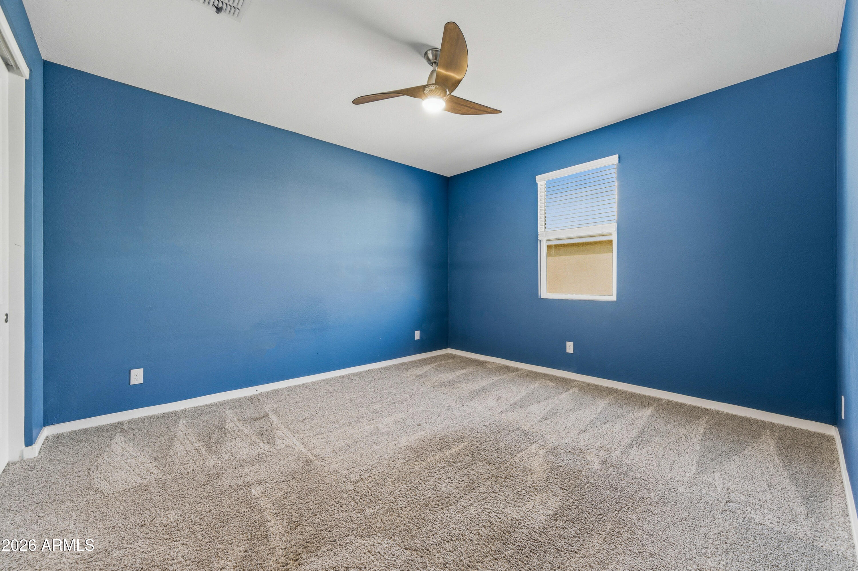 18225 West Pierson Street Goodyear, AZ 85395 - Photo 10 of 39 a view of an empty room