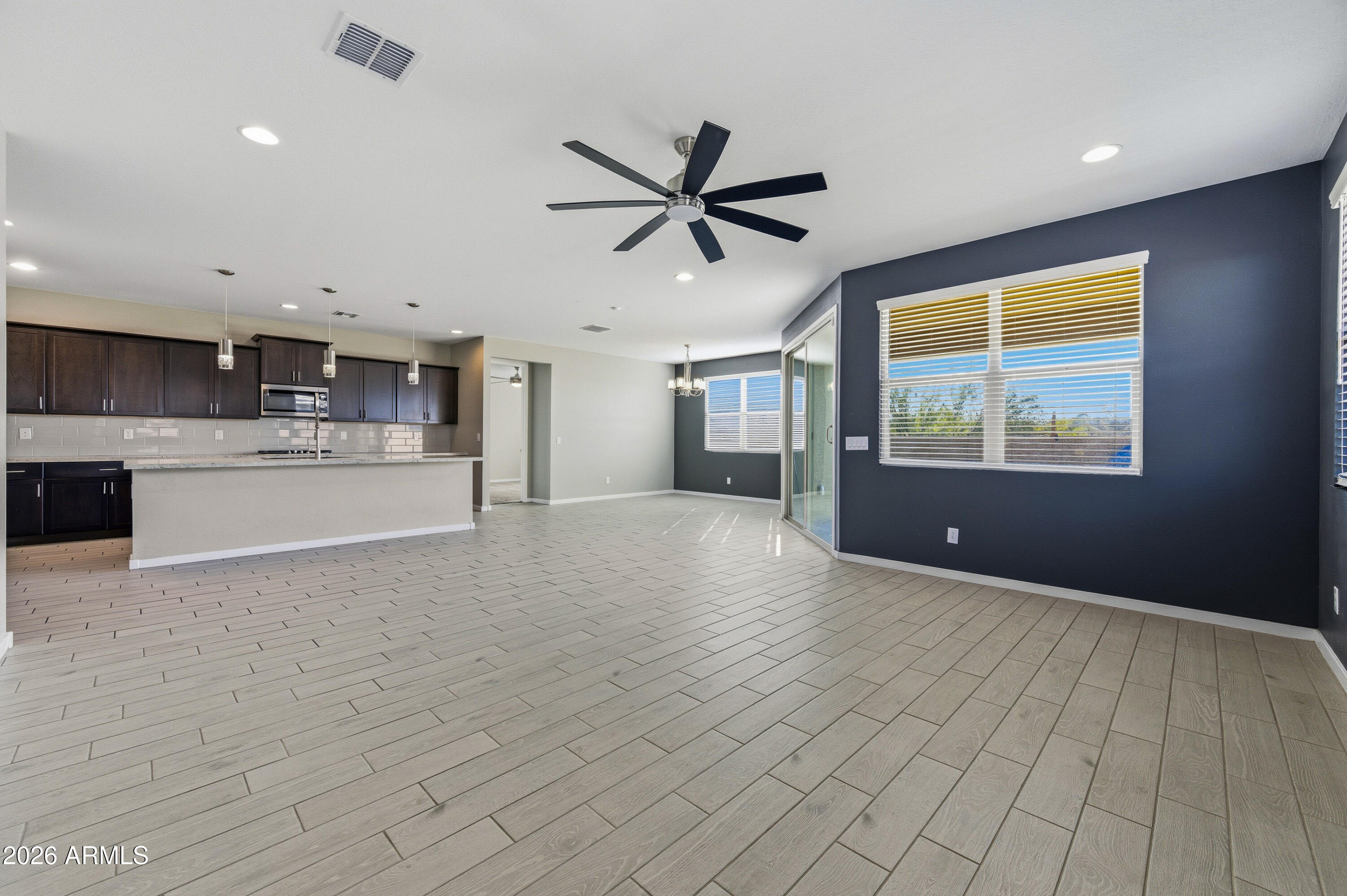 18225 West Pierson Street Goodyear, AZ 85395 - Photo 13 of 39 a view of an empty room with a window