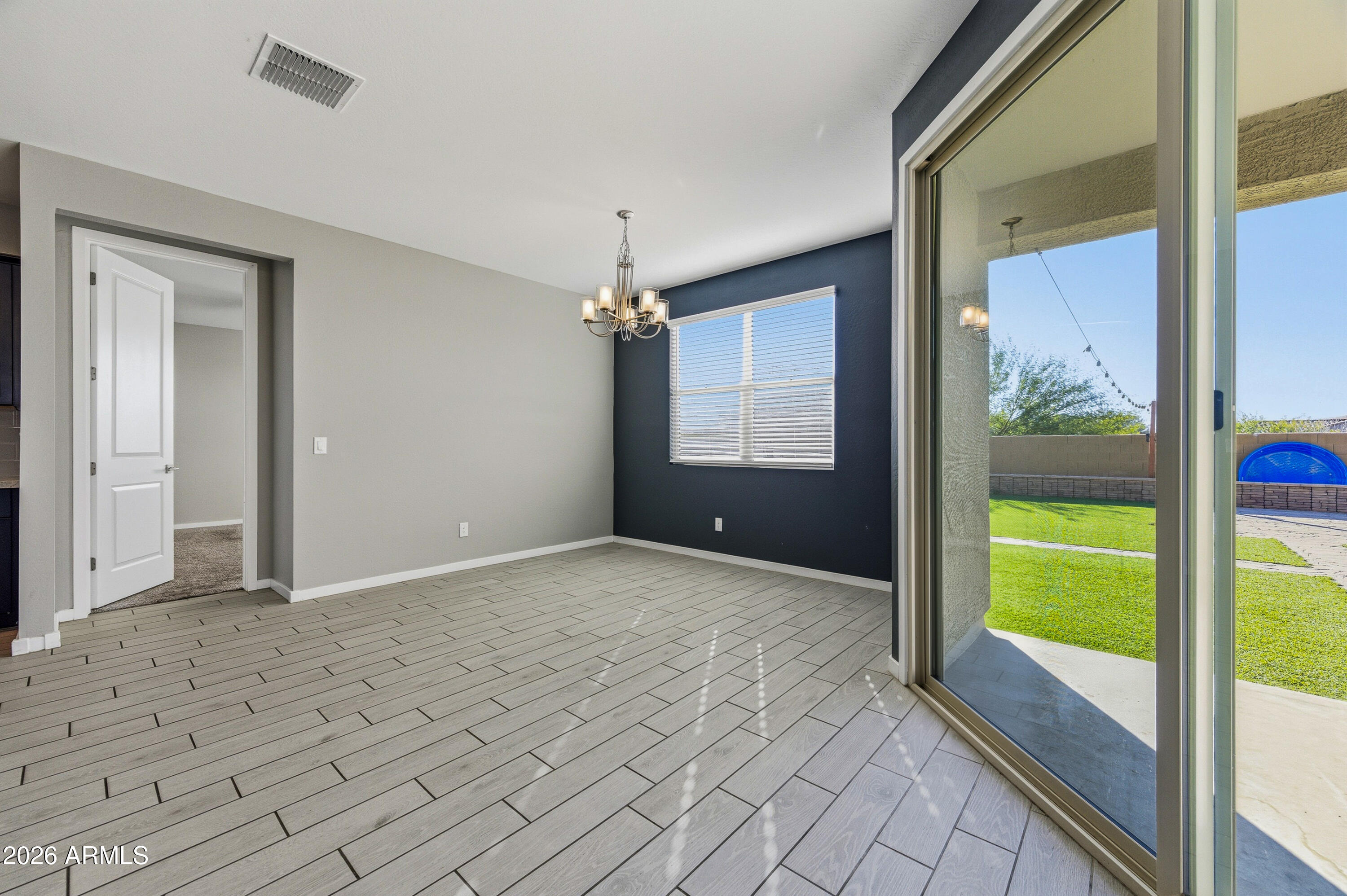 18225 West Pierson Street Goodyear, AZ 85395 - Photo 15 of 39 a view of an empty room and window