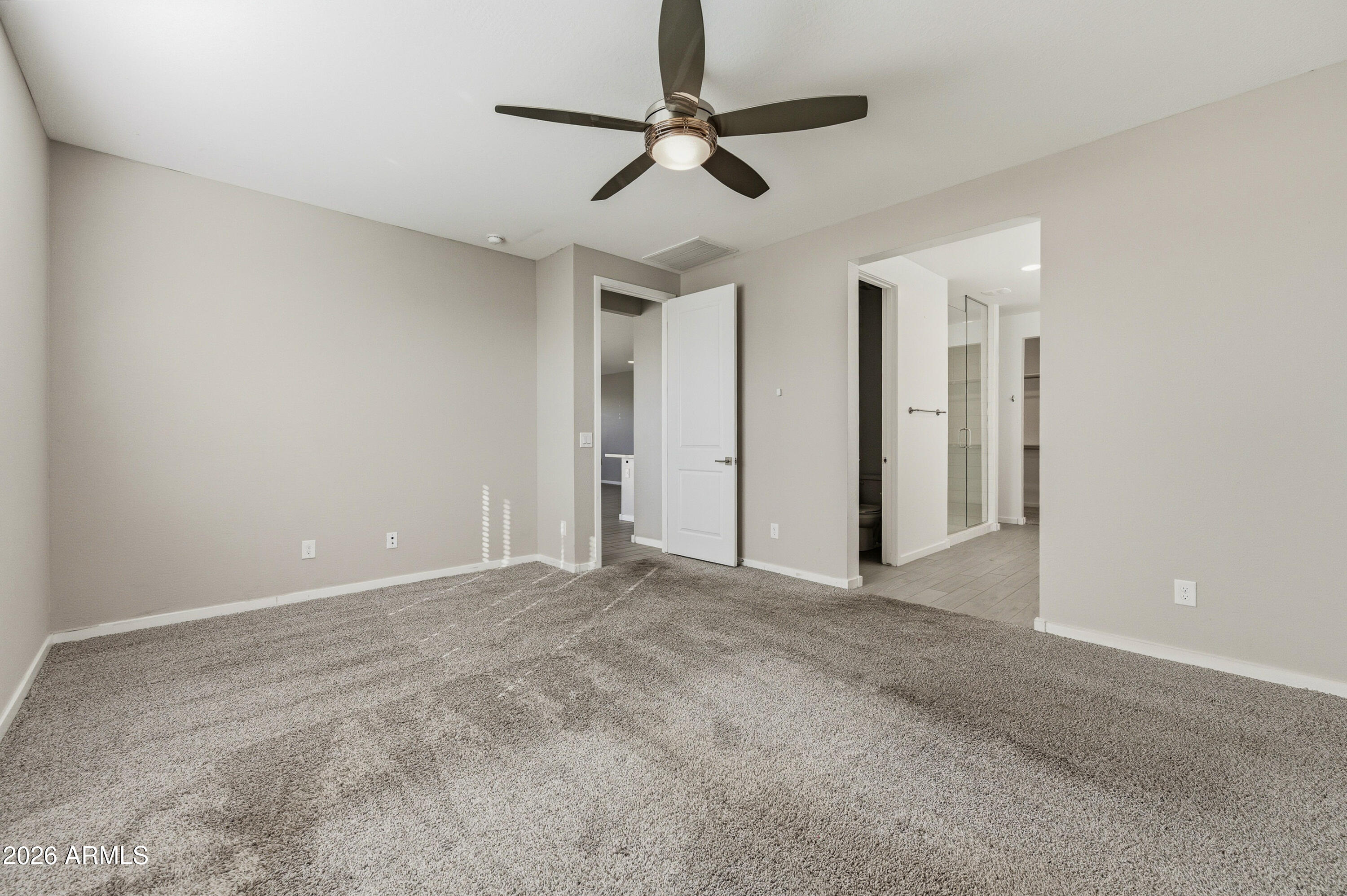 18225 West Pierson Street Goodyear, AZ 85395 - Photo 23 of 39 a view of empty room with ceiling fan