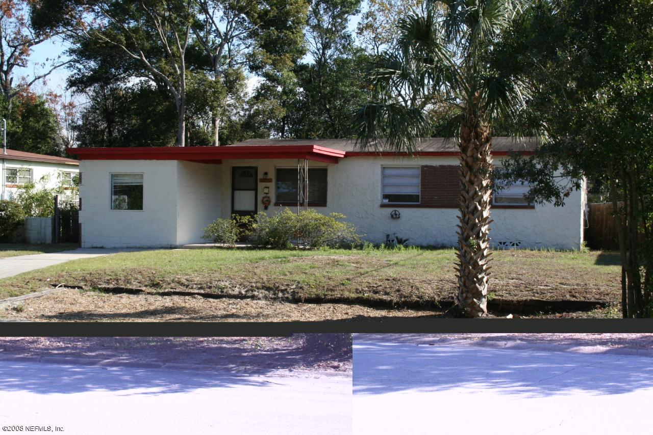 2705 Lorna Road Jacksonville, FL 32211 - Photo 1 of 18 a front view of a house with a garden