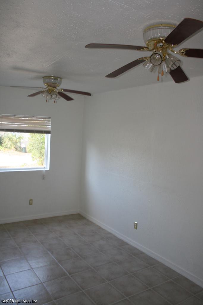 2705 Lorna Road Jacksonville, FL 32211 - Photo 8 of 18 a view of an empty room with a window