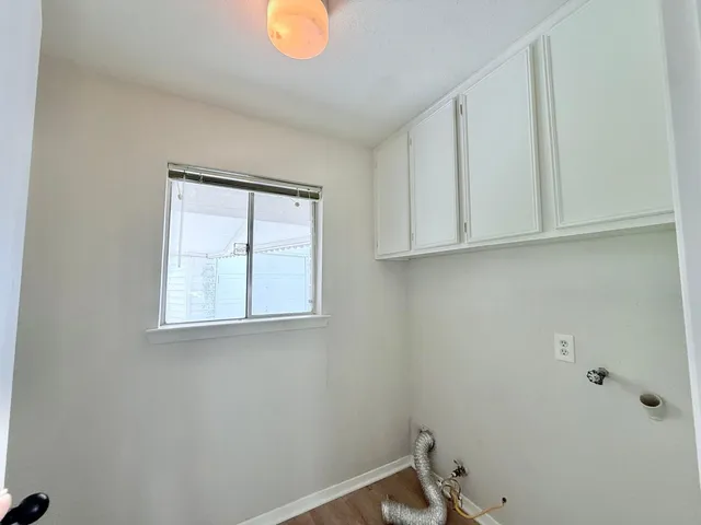 a view of a room with rack on the wall