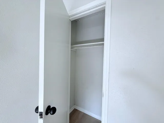 a view of a closet in a room