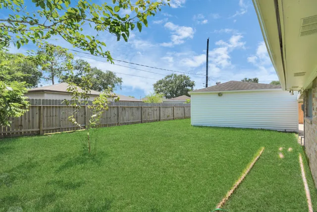 a view of a backyard with a garden