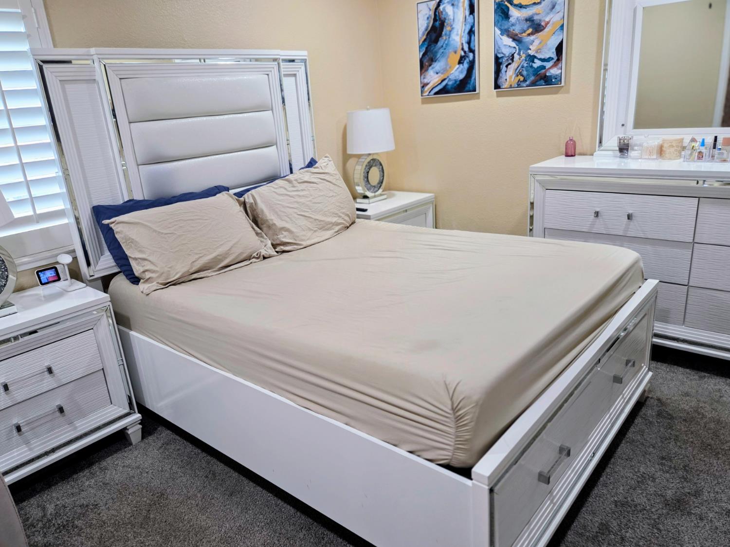 1404 Solar Avenue Modesto, CA 95351 - Photo 13 of 28 a bedroom with a bed and a dresser