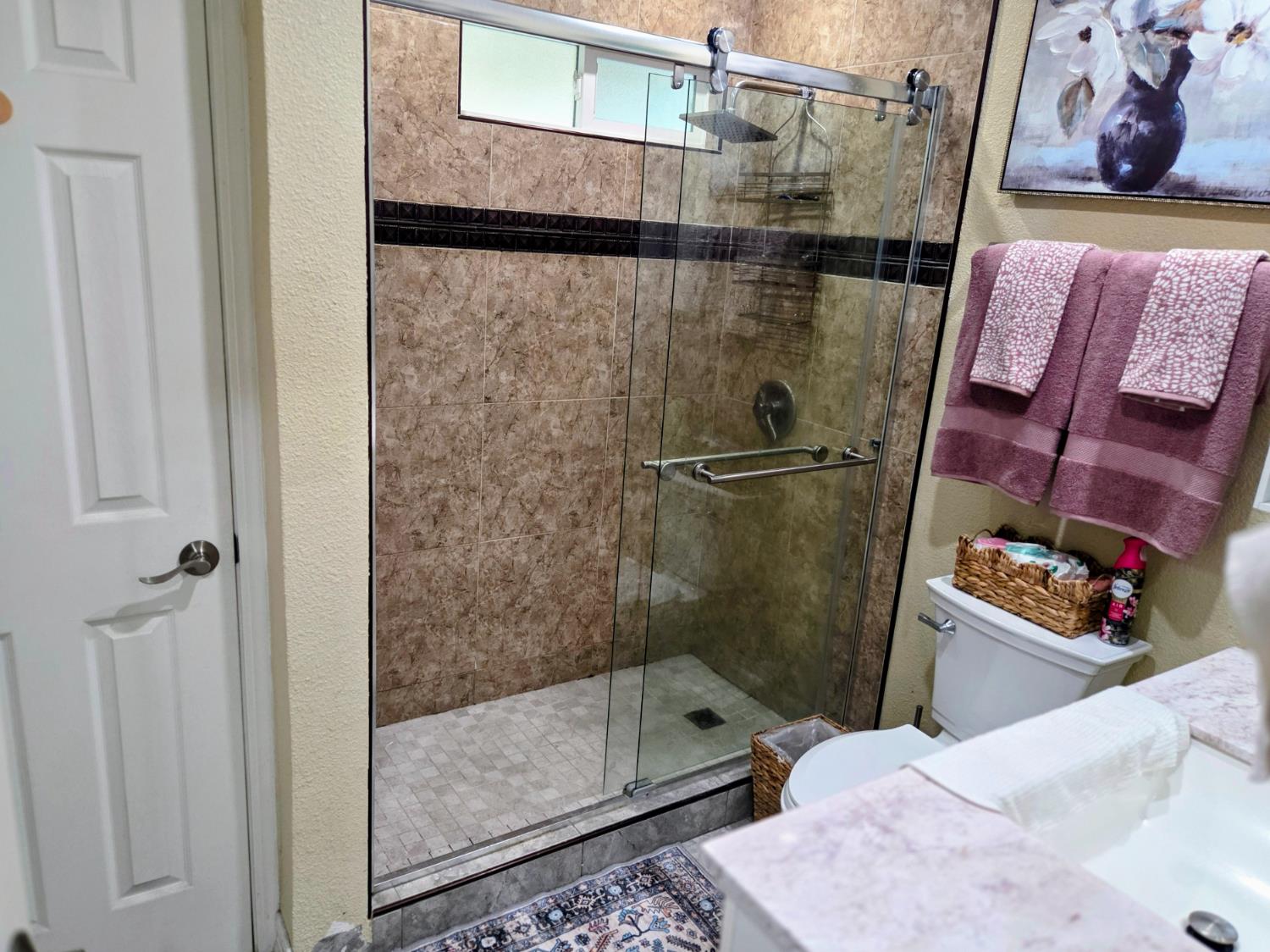 1404 Solar Avenue Modesto, CA 95351 - Photo 15 of 28 a bathroom with a shower and a sink