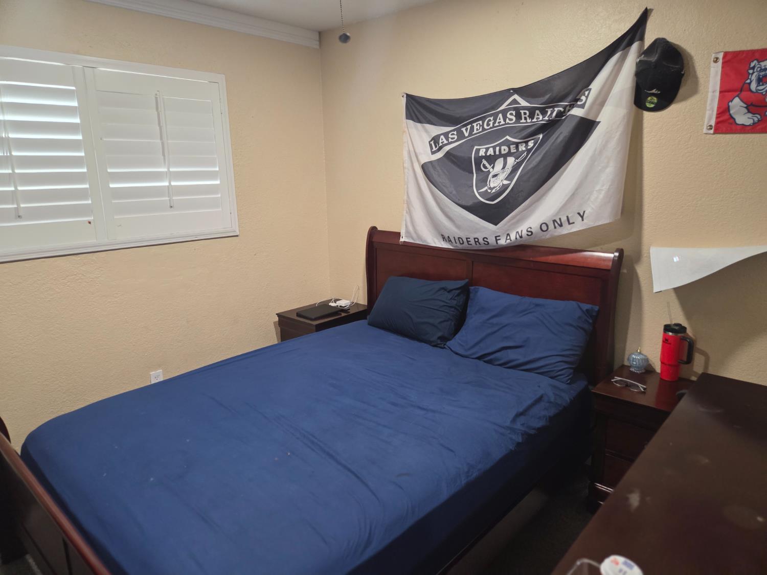 1404 Solar Avenue Modesto, CA 95351 - Photo 20 of 28 a bedroom with a bed and window