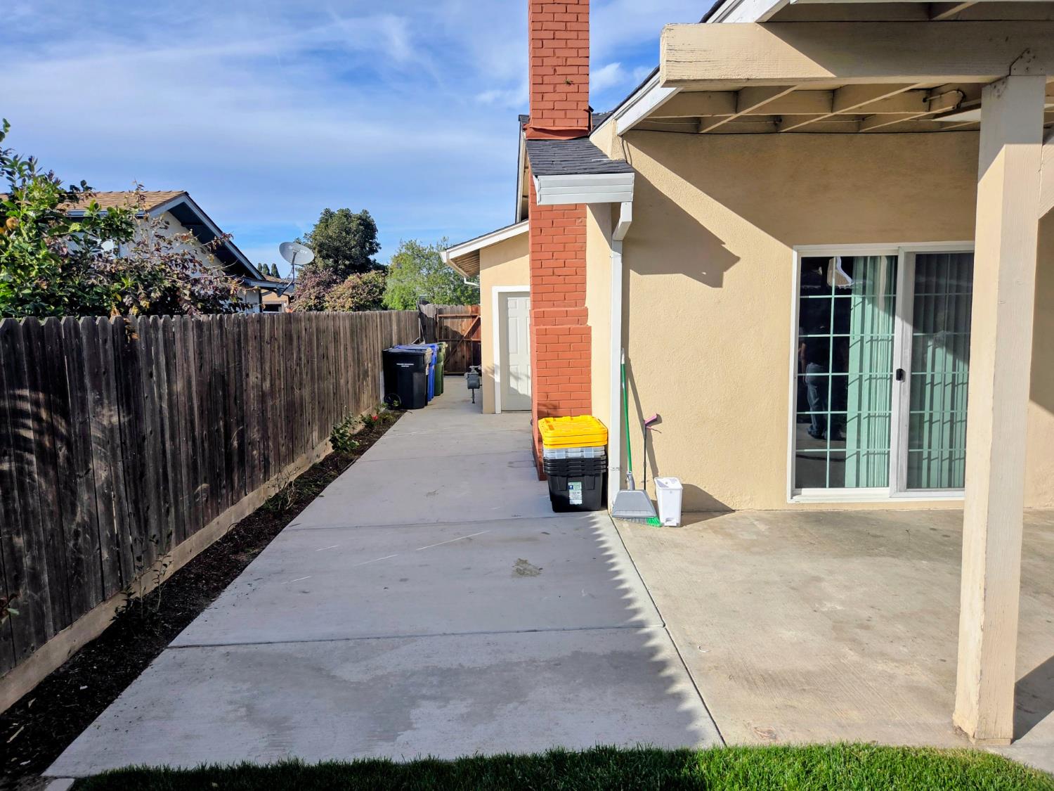 1404 Solar Avenue Modesto, CA 95351 - Photo 22 of 28 a view of a house with wooden fence