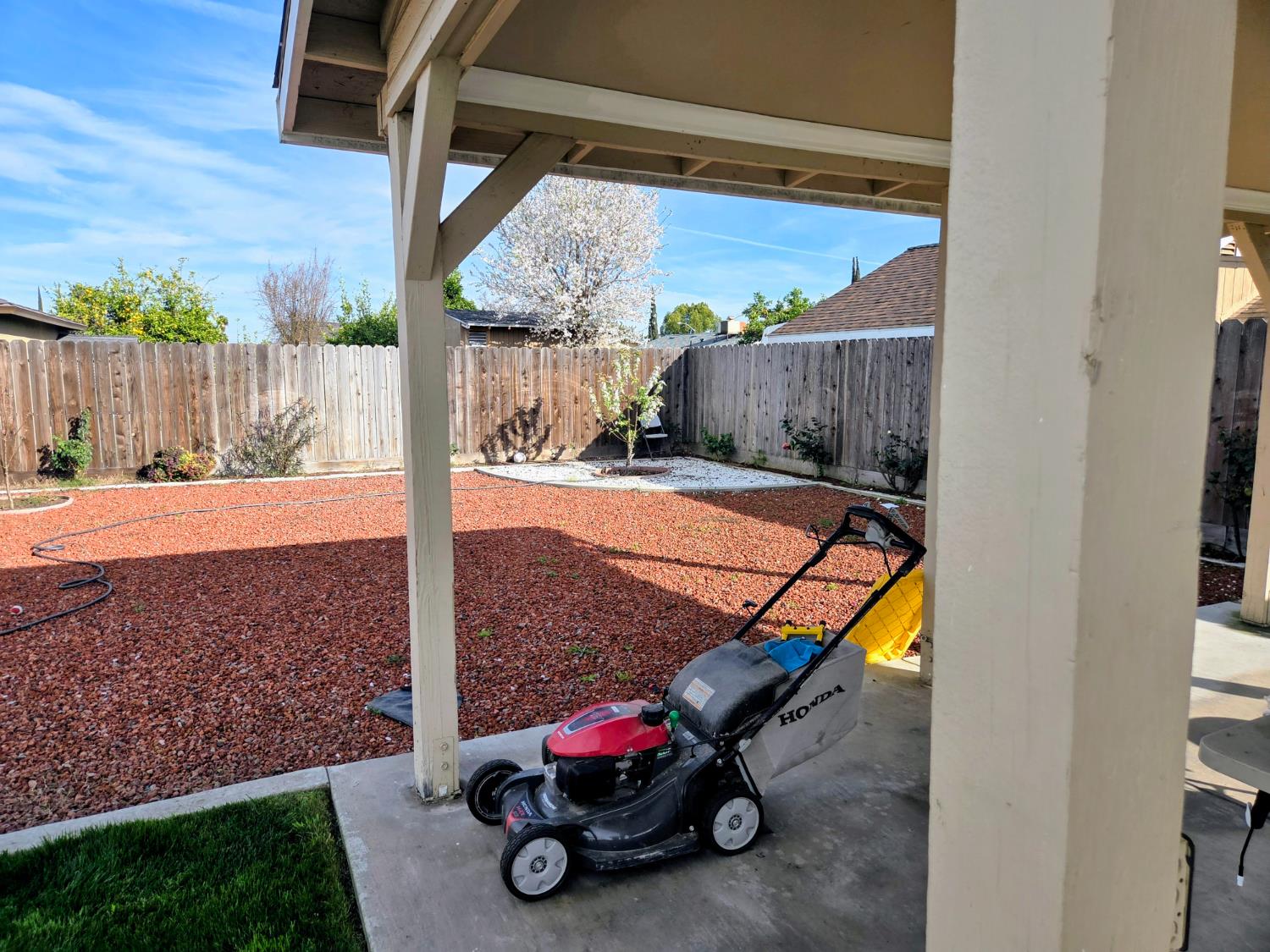 1404 Solar Avenue Modesto, CA 95351 - Photo 24 of 28 a view of a backyard with wooden fence