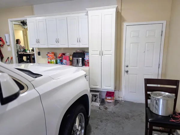 a kitchen with a refrigerator and countertop