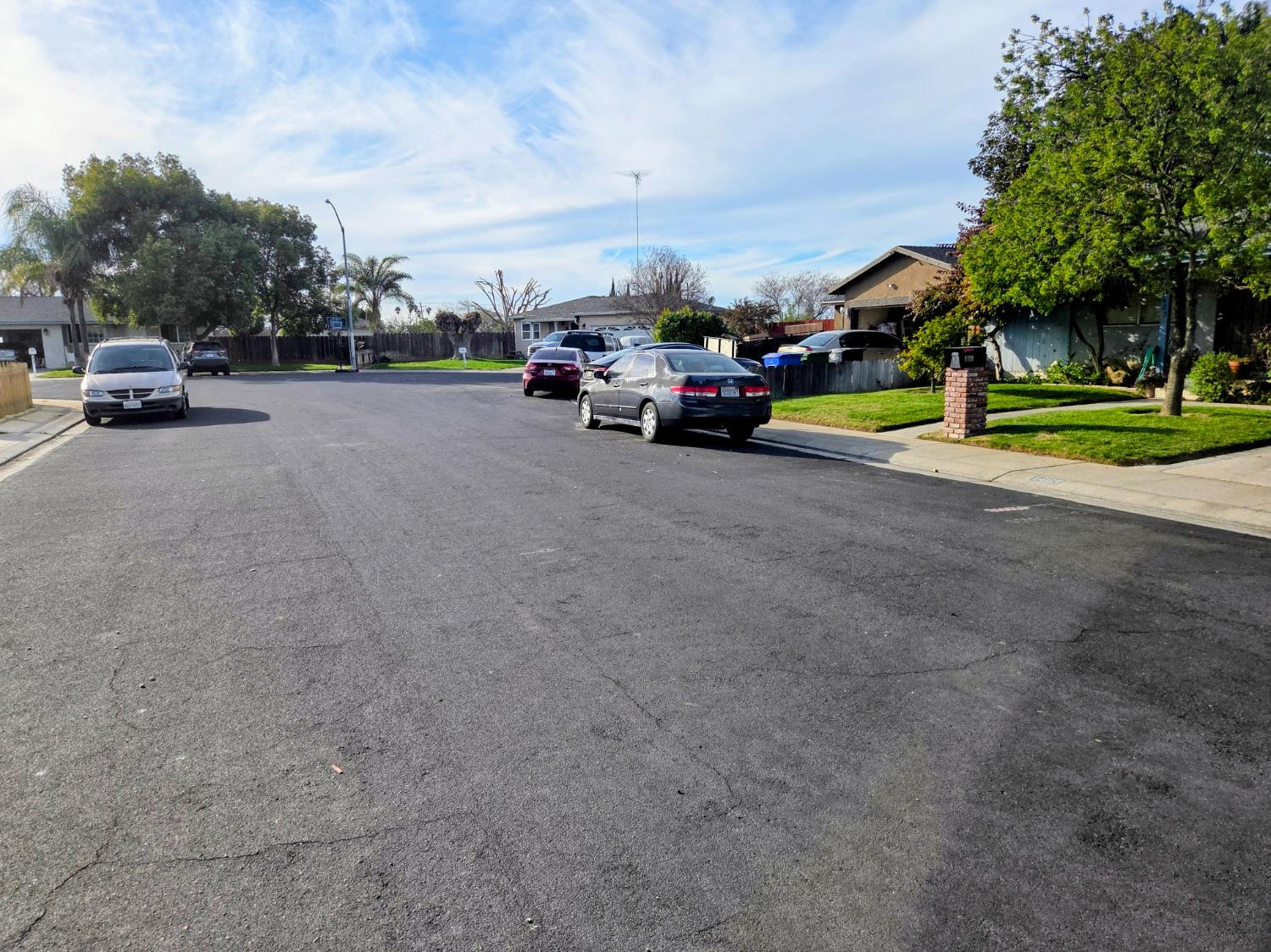 1404 Solar Avenue Modesto, CA 95351 - Photo 4 of 28 a car parked on the side of a street