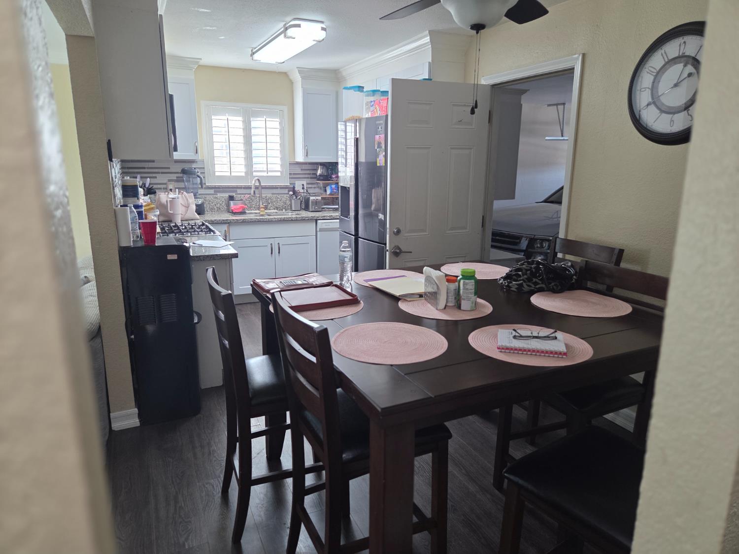 1404 Solar Avenue Modesto, CA 95351 - Photo 8 of 28 a dining room with furniture and window