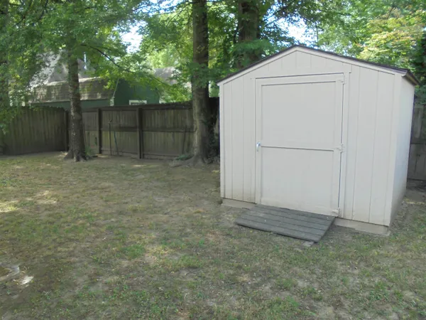 a view of backyard of house