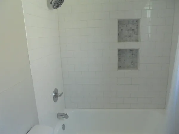 a close up of a bathtub