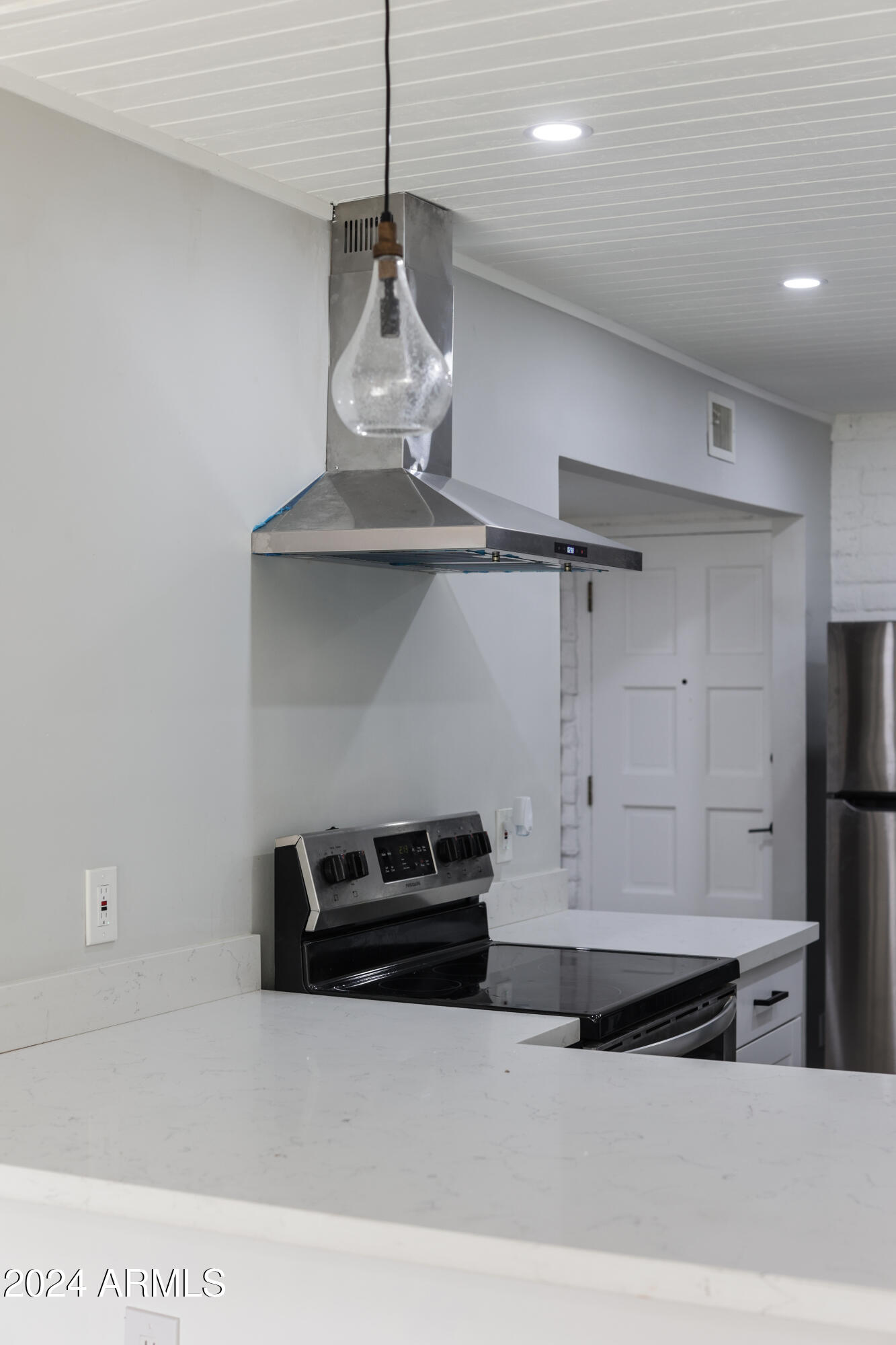 3002 North 32nd Street, Unit 19 Phoenix, AZ 85018 - Photo 15 of 26 a kitchen with a refrigerator and a sink