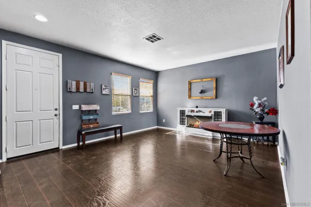 a view of a livingroom with furniture and a furniture