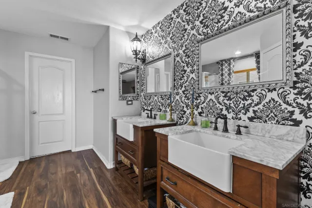 a bathroom with a sink and a mirror