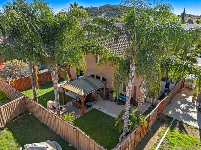 a view of a garden with deck