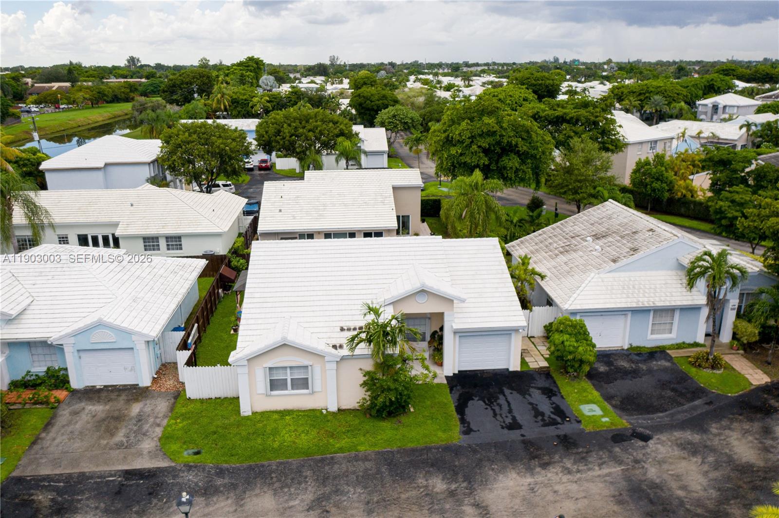 6410 Southwest 112th Place Miami, FL 33173 - Photo 17 of 19 an aerial view of a house with garden space and street view