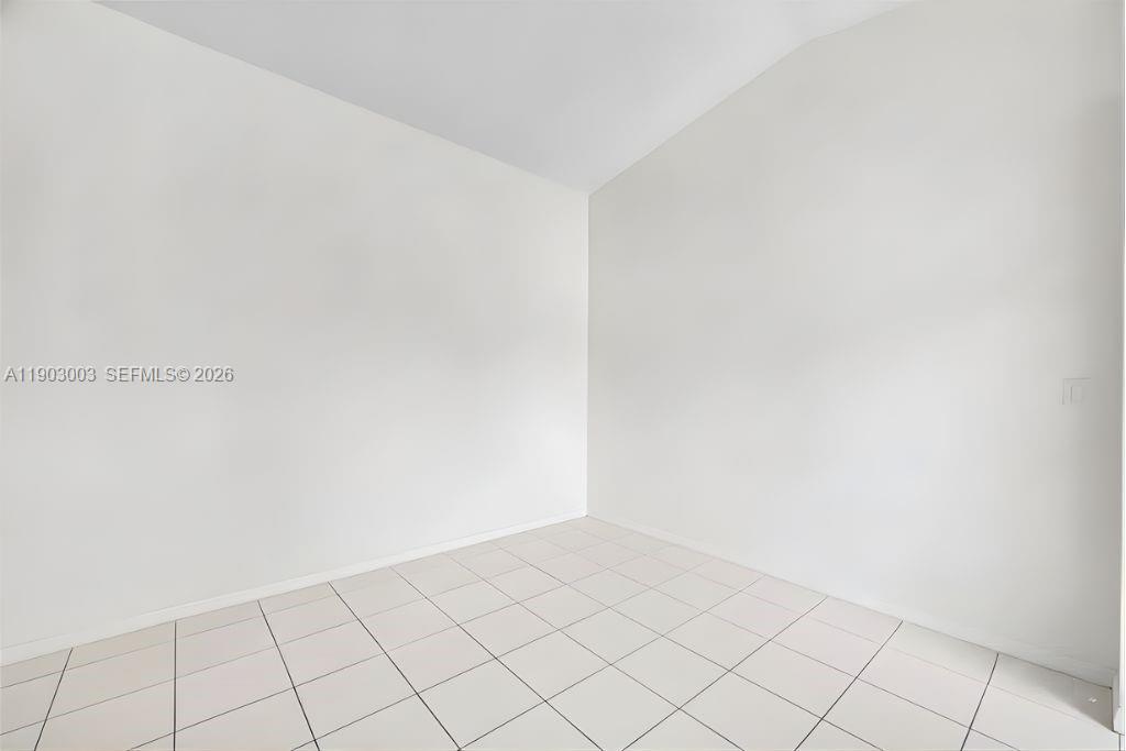 6410 Southwest 112th Place Miami, FL 33173 - Photo 6 of 19 a view of an empty room