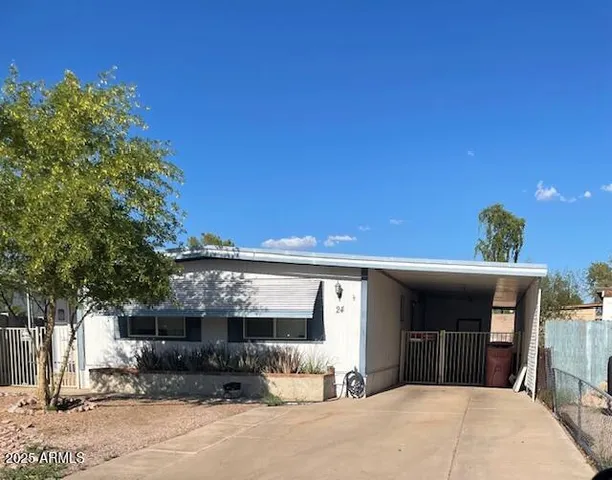 a front view of a house with a garage
