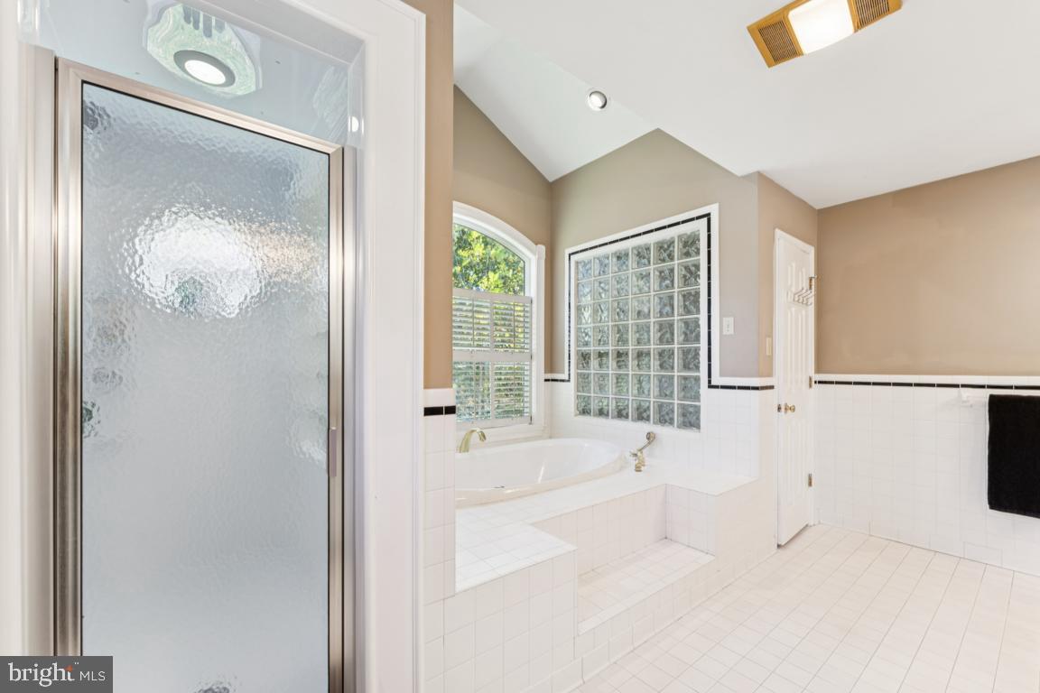 1230 Allview Drive Hampstead, MD 21074 - Photo 14 of 30 a spacious bathroom with a bathtub and a shower