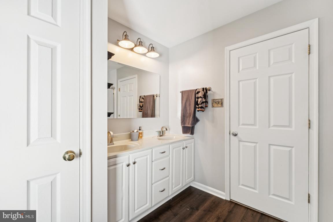 1230 Allview Drive Hampstead, MD 21074 - Photo 15 of 30 a spacious bathroom with a double vanity sink a mirror and shower