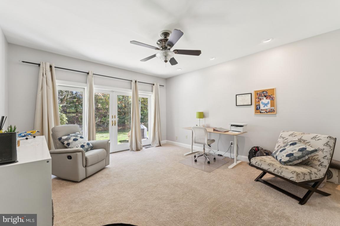 1230 Allview Drive Hampstead, MD 21074 - Photo 22 of 30 a living room with furniture and a large window