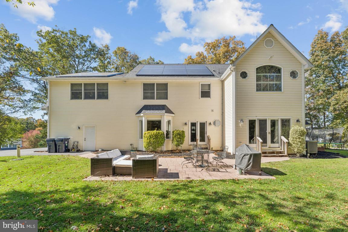 1230 Allview Drive Hampstead, MD 21074 - Photo 25 of 30 a backyard of a house with table and chairs