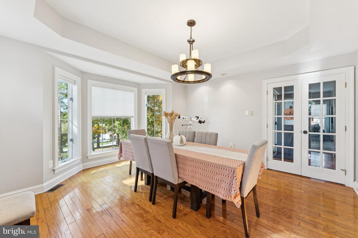 1230 Allview Drive Hampstead, MD 21074 - Photo 7 of 30 a view of a dining room with furniture window and wooden floor
