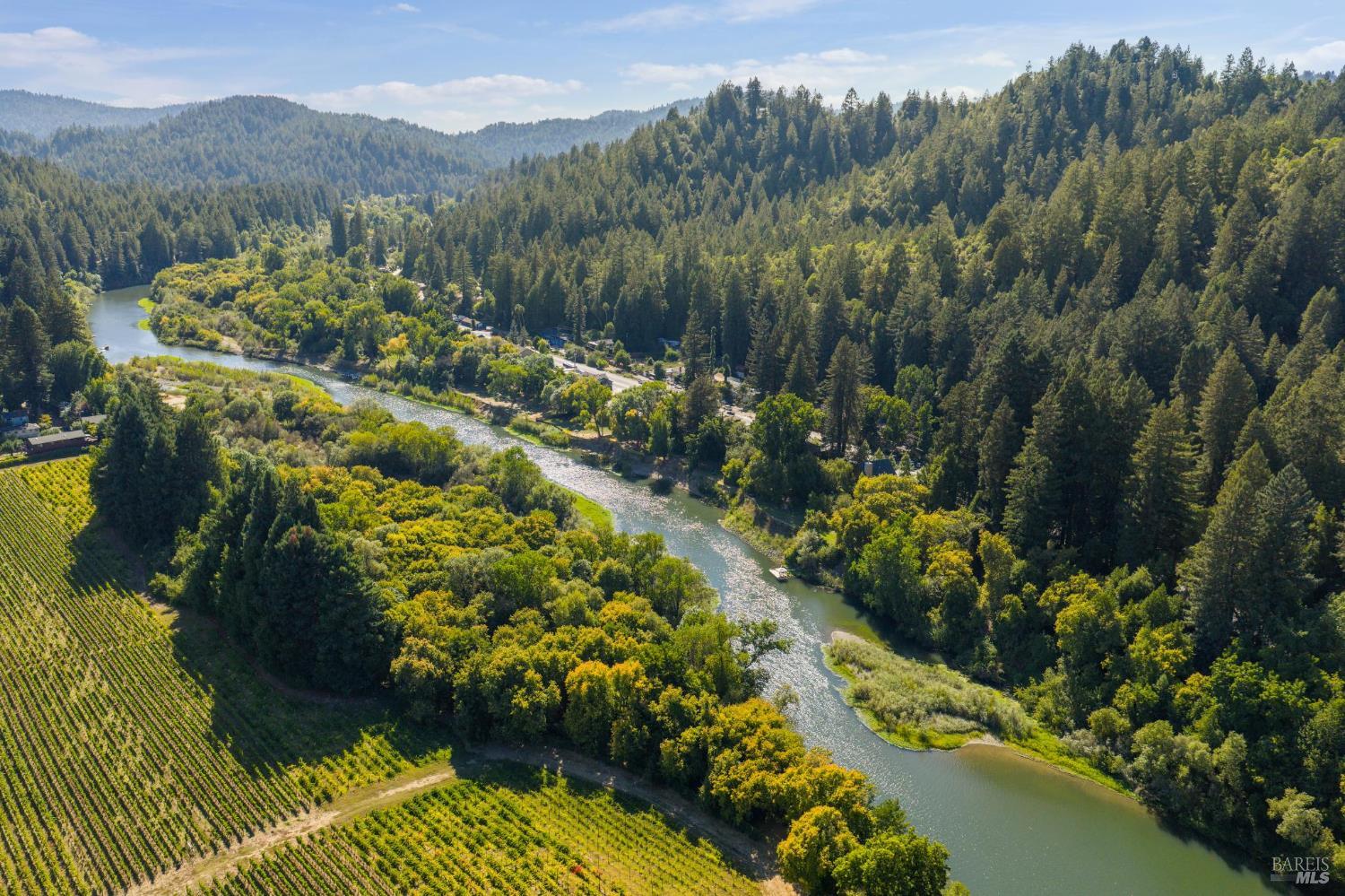 14595 Drake Road Guerneville, CA 95446 - Photo 23 of 25 a view of a lake with a mountain