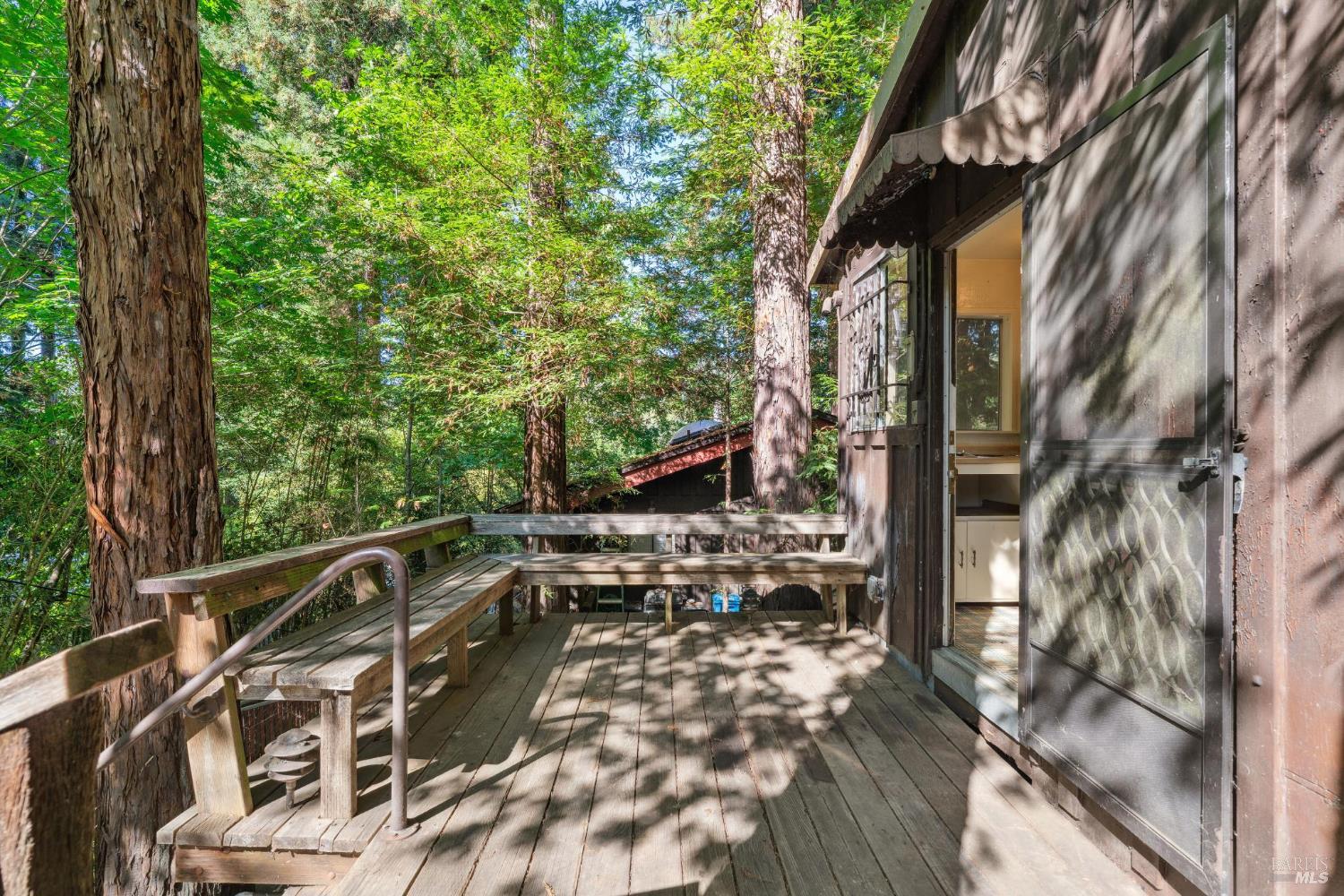 14595 Drake Road Guerneville, CA 95446 - Photo 4 of 25 a view of balcony with wooden floor and fence