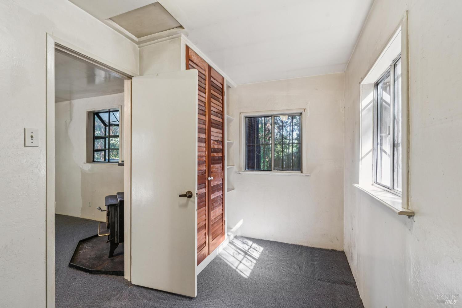 14595 Drake Road Guerneville, CA 95446 - Photo 9 of 25 a view of livingroom with furniture and windows