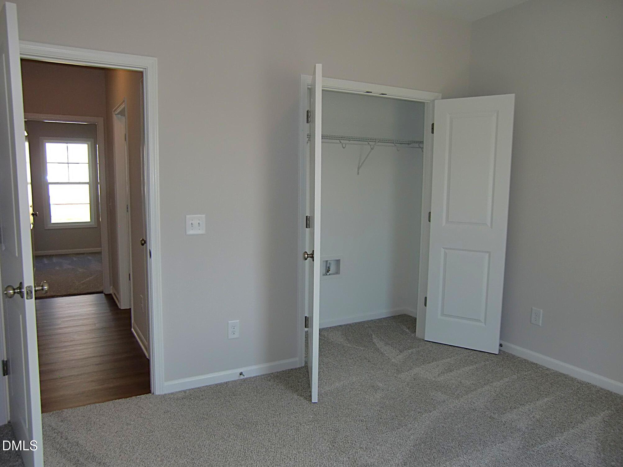 100 Covington Lane Dunn, NC 28334 - Photo 57 of 61 wooden floor and closet in a room