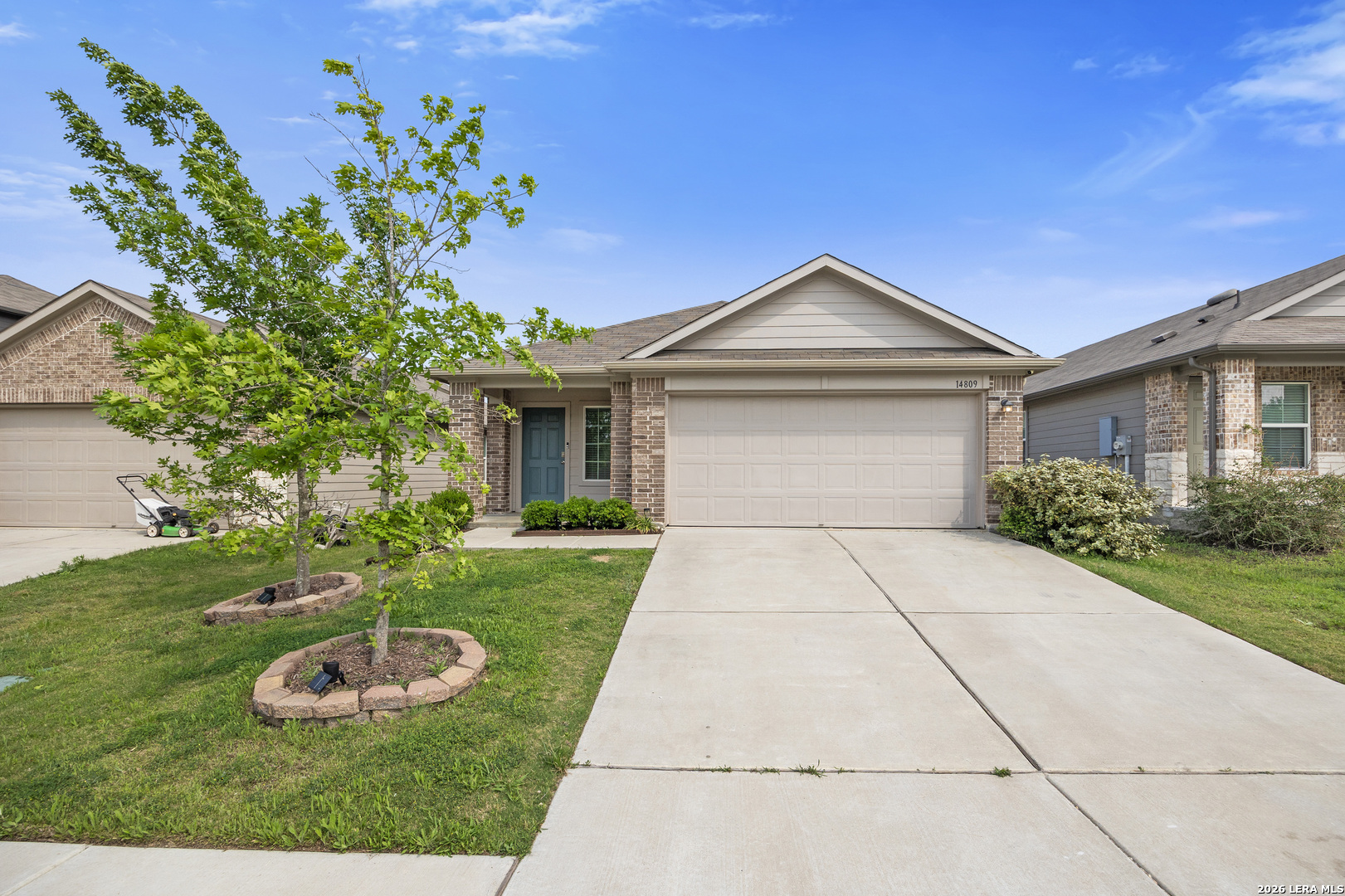 14809 Bajada Road Manor, TX 78653 - Photo 2 of 30 a front view of a house with a yard