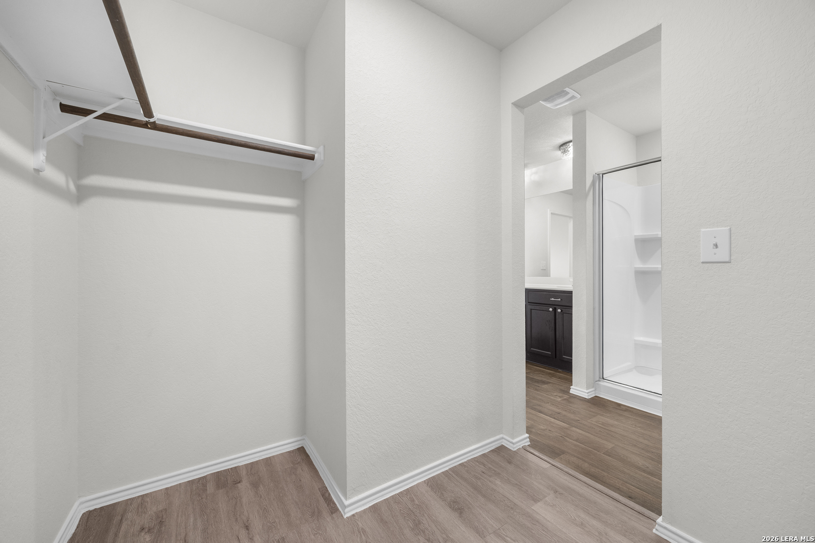 14809 Bajada Road Manor, TX 78653 - Photo 21 of 30 a view of hallway with wooden floor