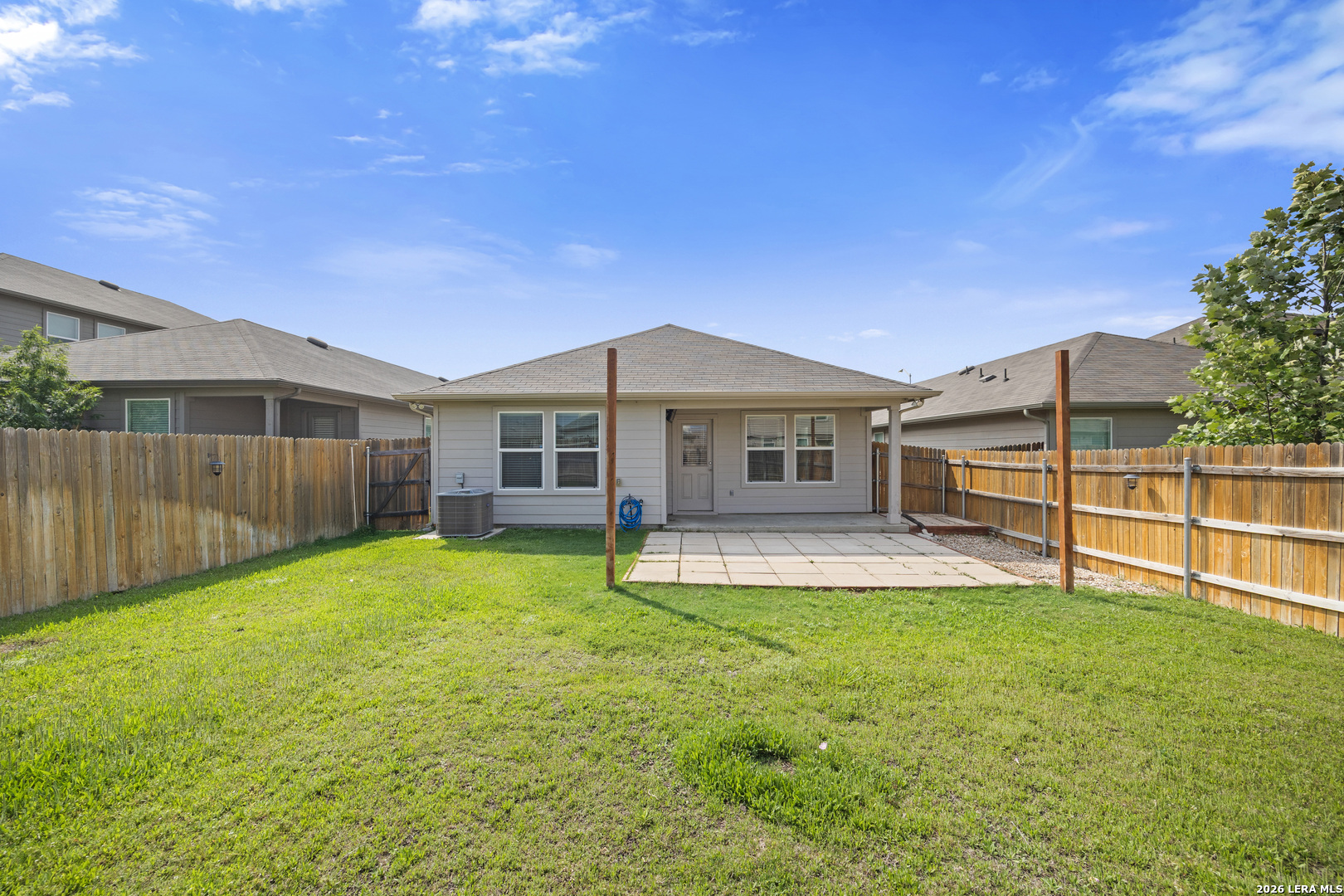 14809 Bajada Road Manor, TX 78653 - Photo 27 of 30 a view of a house with a yard and sitting area
