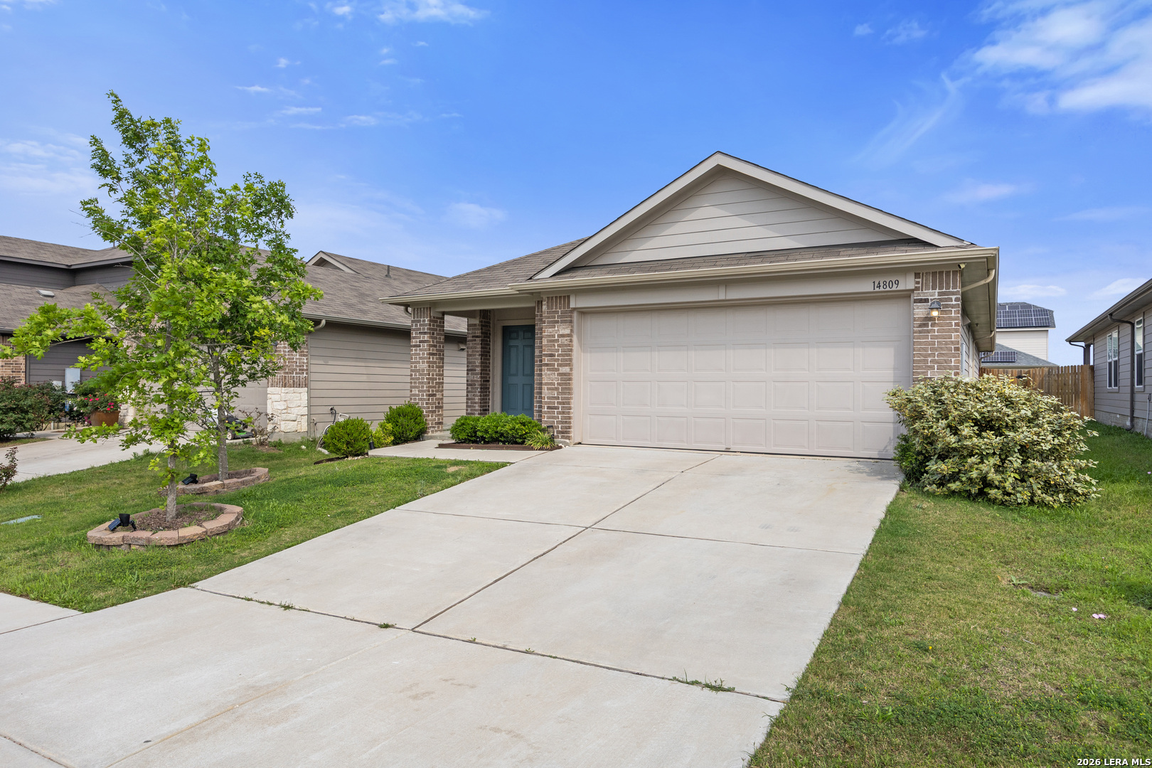 14809 Bajada Road Manor, TX 78653 - Photo 10 of 30 a front view of a house with a yard