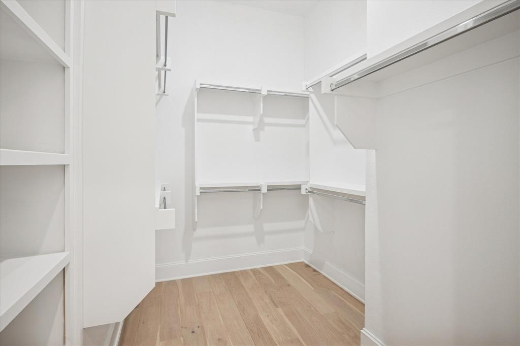 4066 Oak Circle Addison, TX 75001 - Photo 29 of 31 a view of an empty walk in closet