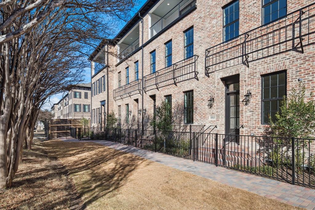 4066 Oak Circle Addison, TX 75001 - Photo 5 of 31 a view of a building with a outdoor space