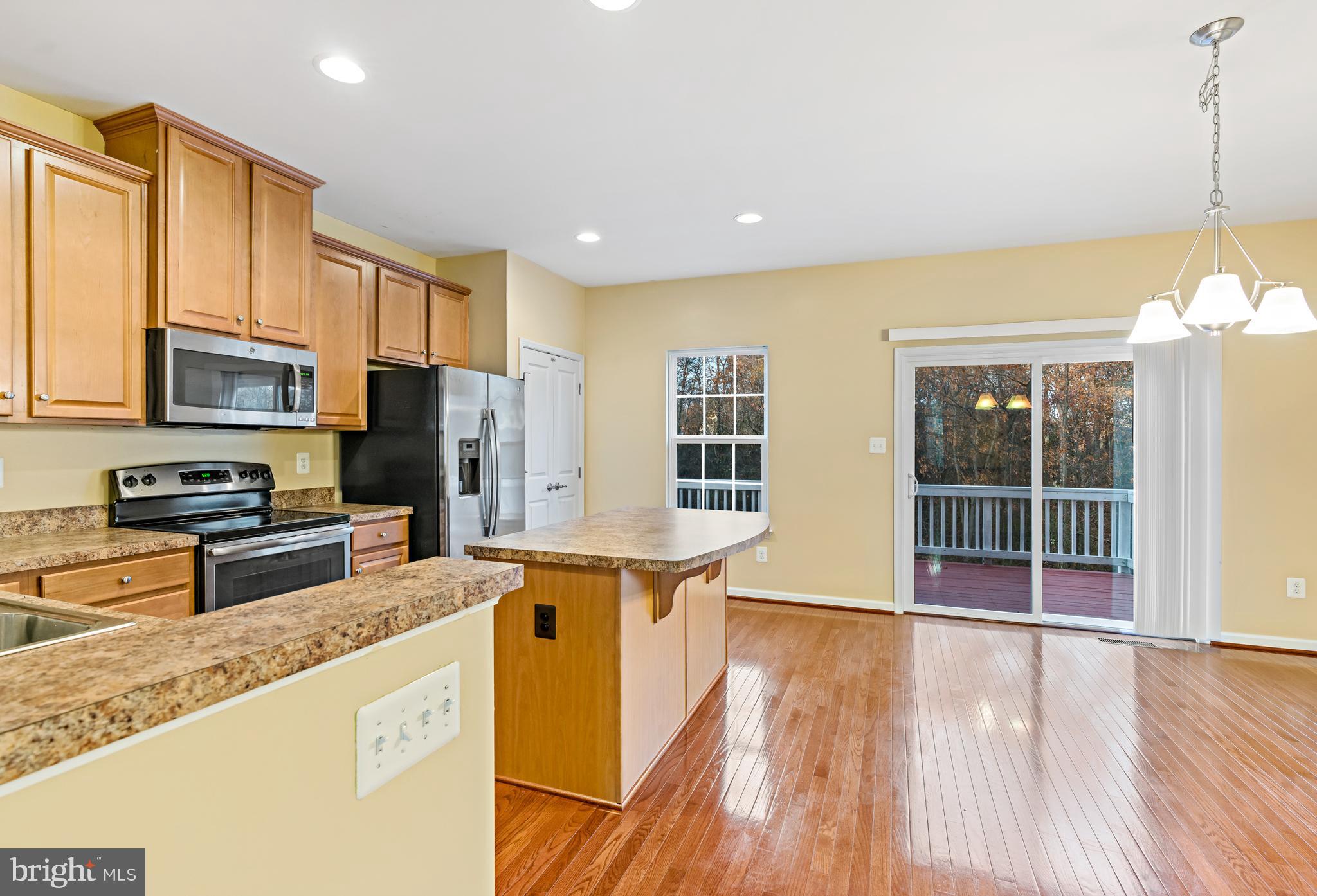 127 Gauley Riv Path Falling Waters, WV 25419 - Photo 6 of 25 Kitchen and dining area