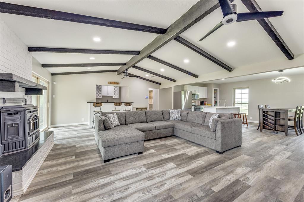 738 Campground Road Sherman, TX 75090 - Photo 15 of 40 a living room with furniture and a fireplace