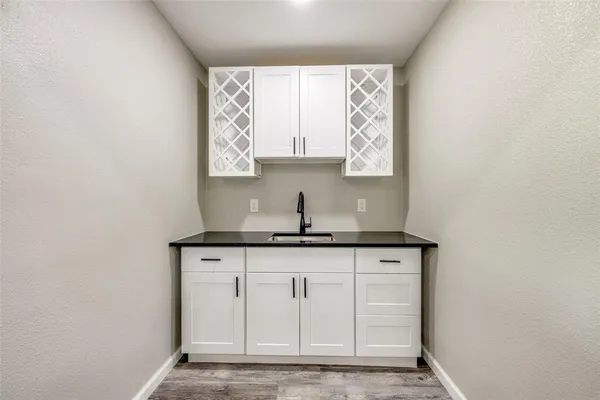 a bedroom with a bed and a ceiling fan